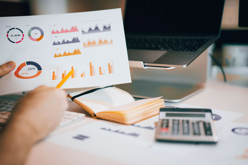 Person reviewing website analytics and performance charts